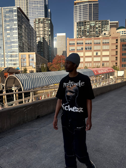 Signature embroidered “Protrude Richezz” tee